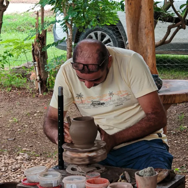Local artisan making pottery during Tempisque river cultural experience