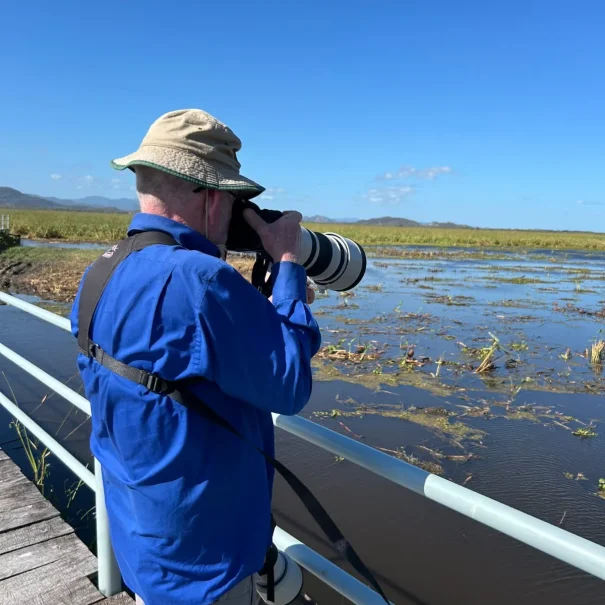 Visitor photographing wildlife during Palo Verde National Park tour